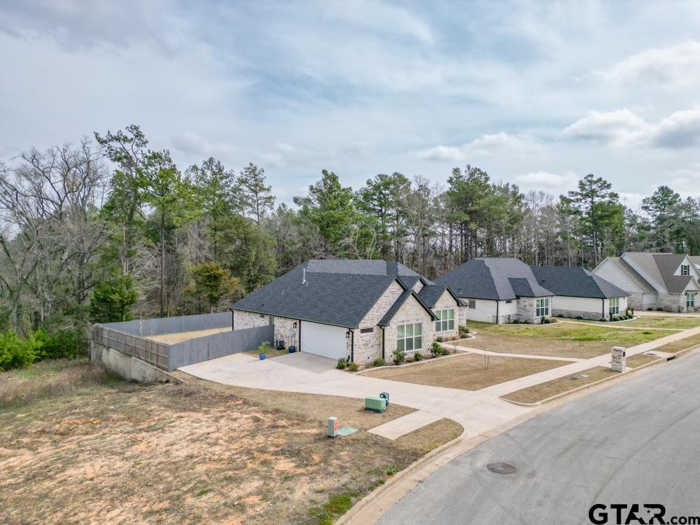 3531 Chapel View Tyler, TX 75707 - Photo 2 of 48 a terrace with a table and chairs