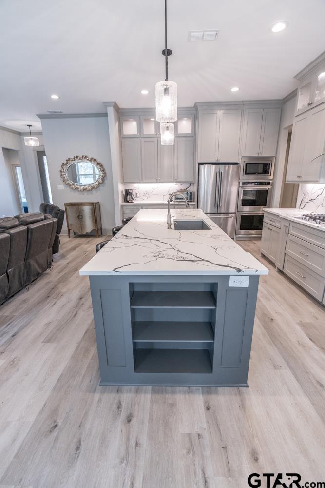3531 Chapel View Tyler, TX 75707 - Photo 21 of 48 a large kitchen with stainless steel appliances a large counter top