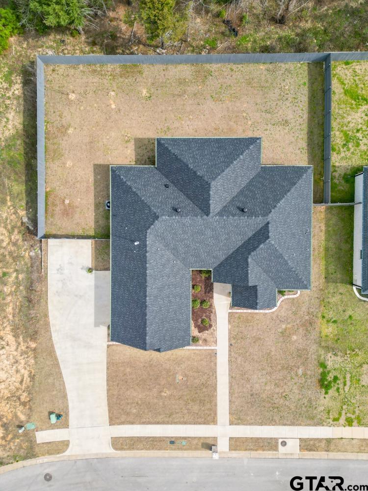 3531 Chapel View Tyler, TX 75707 - Photo 3 of 48 a view of a lake with a floor to ceiling window