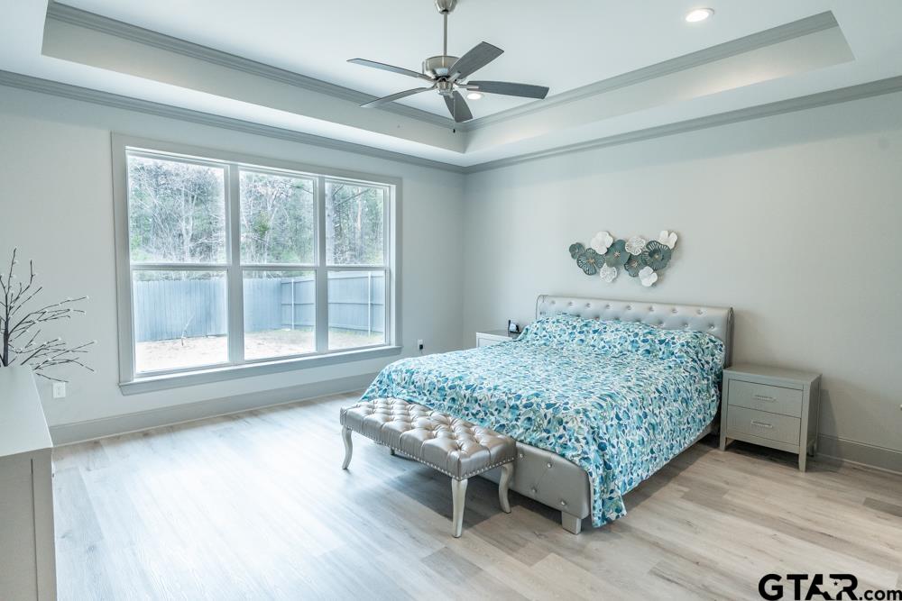 3531 Chapel View Tyler, TX 75707 - Photo 35 of 48 a room with a bed and a table in it