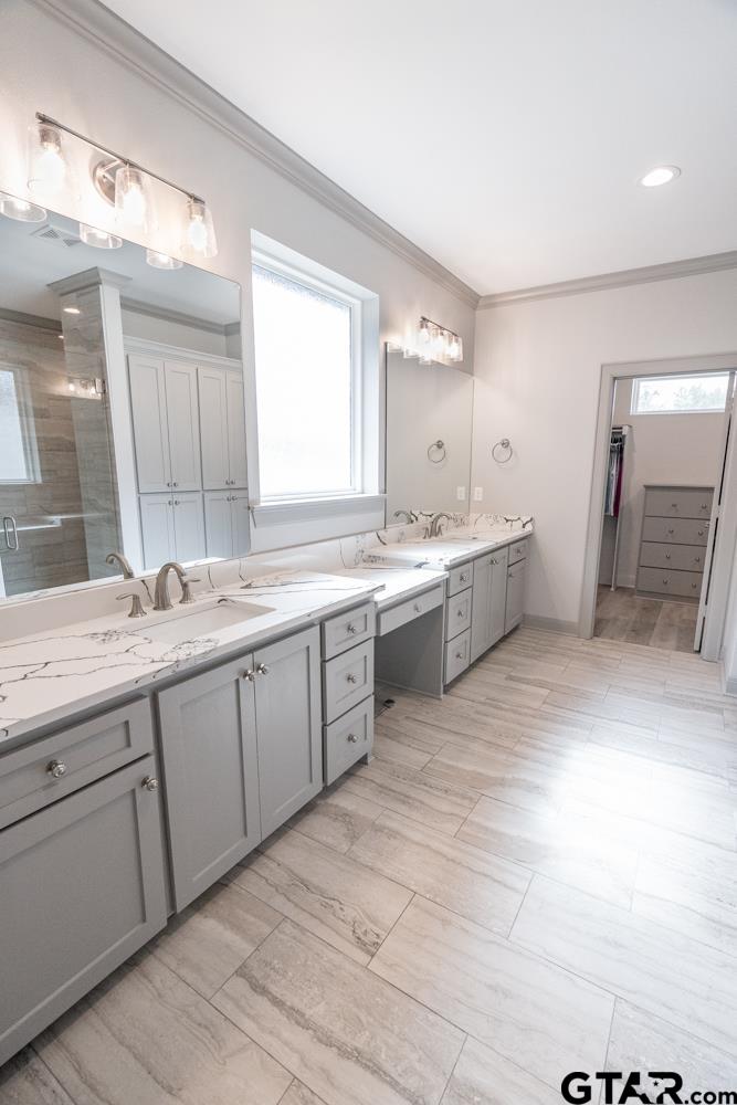 3531 Chapel View Tyler, TX 75707 - Photo 37 of 48 a large bathroom with a sink mirror and a bathtub