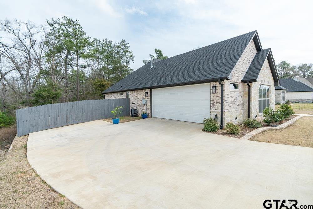 3531 Chapel View Tyler, TX 75707 - Photo 4 of 48 front view of a house with a garage