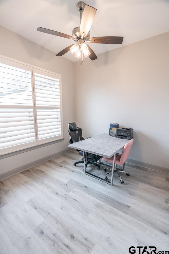 3531 Chapel View Tyler, TX 75707 - Photo 10 of 48 a living room with furniture a window and a chandelier