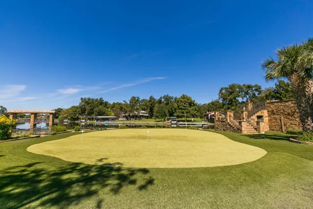 a view of a swimming pool and an outdoor space