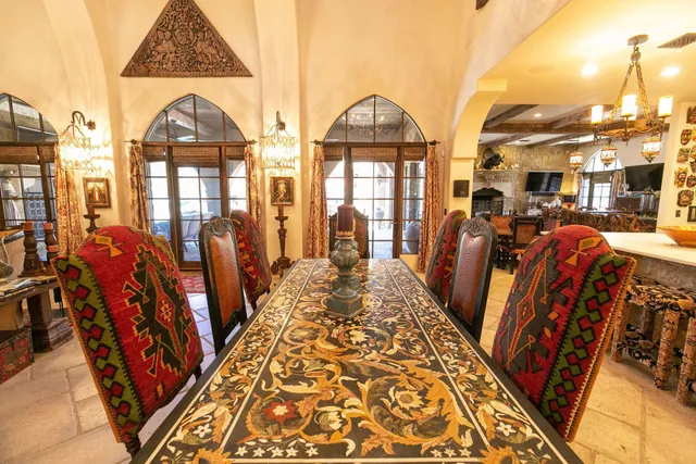 a view of a very nice looking room with many windows