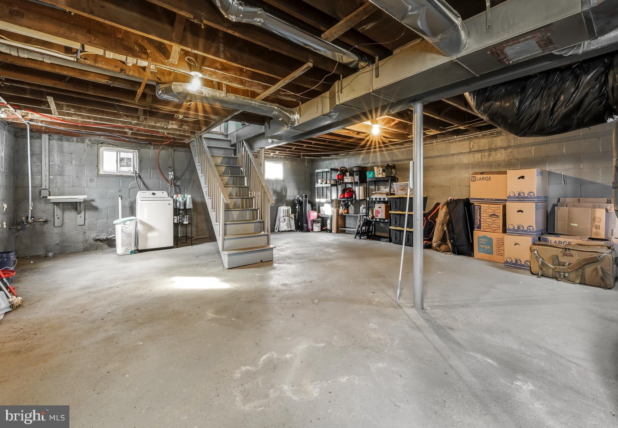 1287 Clements Bridge Road Woodbury, NJ 08096 - Photo 14 of 16 a view of a garage with storage