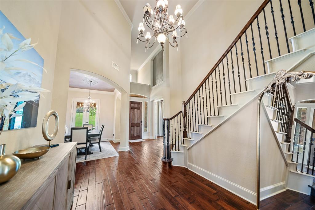 5048 Exposition Way Fort Worth, TX 76244 - Photo 20 of 39 a view of entryway and hall with wooden floor