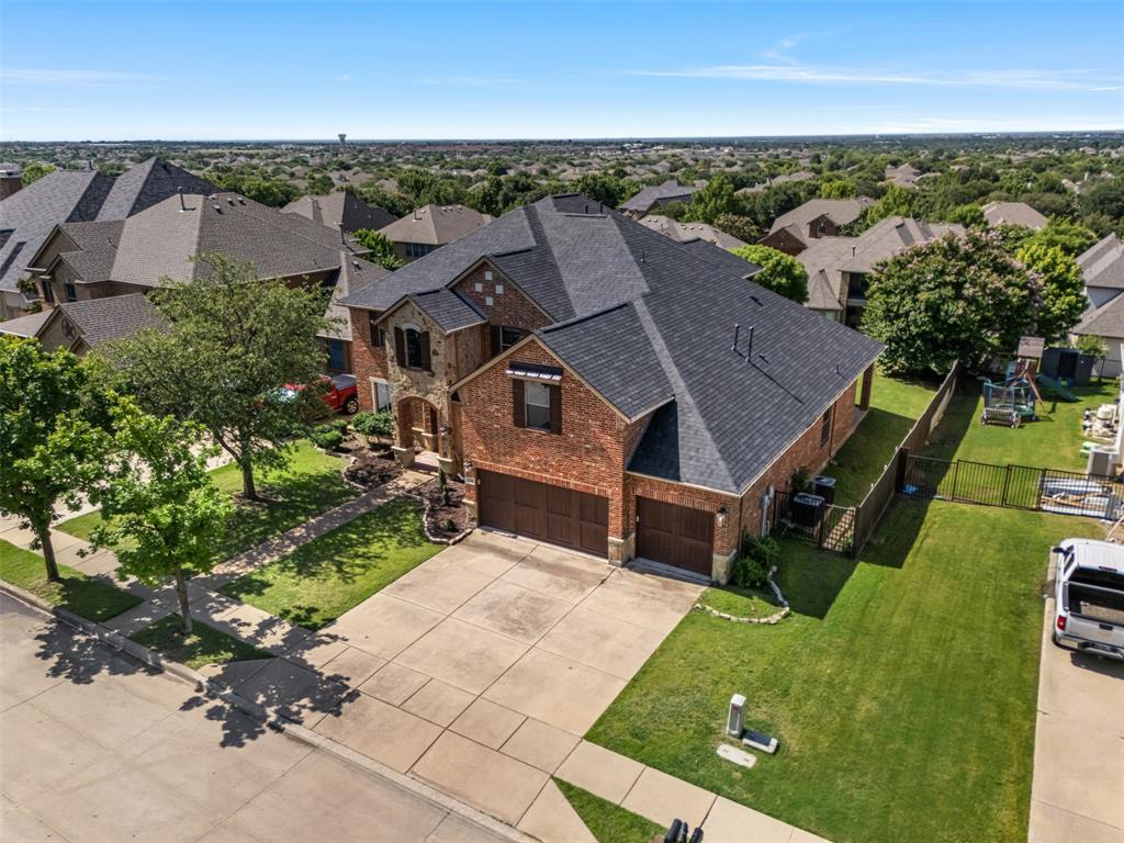 5048 Exposition Way Fort Worth, TX 76244 - Photo 2 of 39 an aerial view of a house with a garden