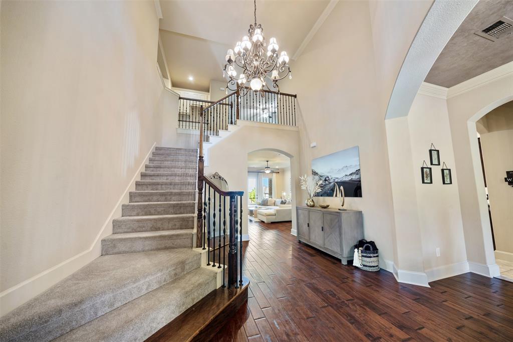 5048 Exposition Way Fort Worth, TX 76244 - Photo 21 of 39 a view of entryway and hall with wooden floor