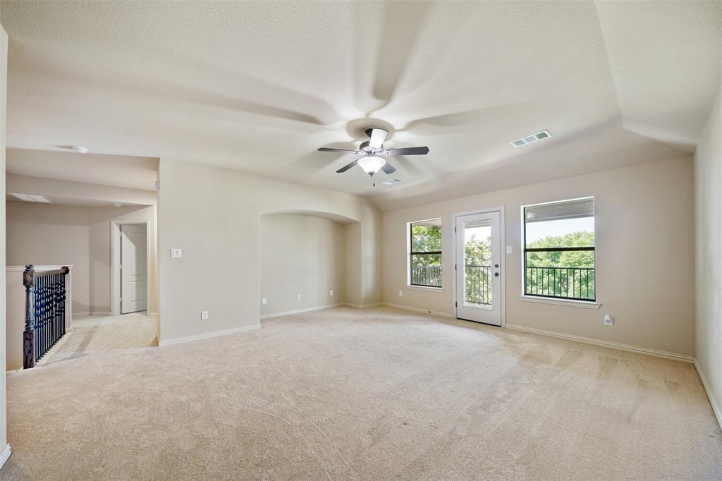 5048 Exposition Way Fort Worth, TX 76244 - Photo 22 of 39 a view of a livingroom with a ceiling fan and window