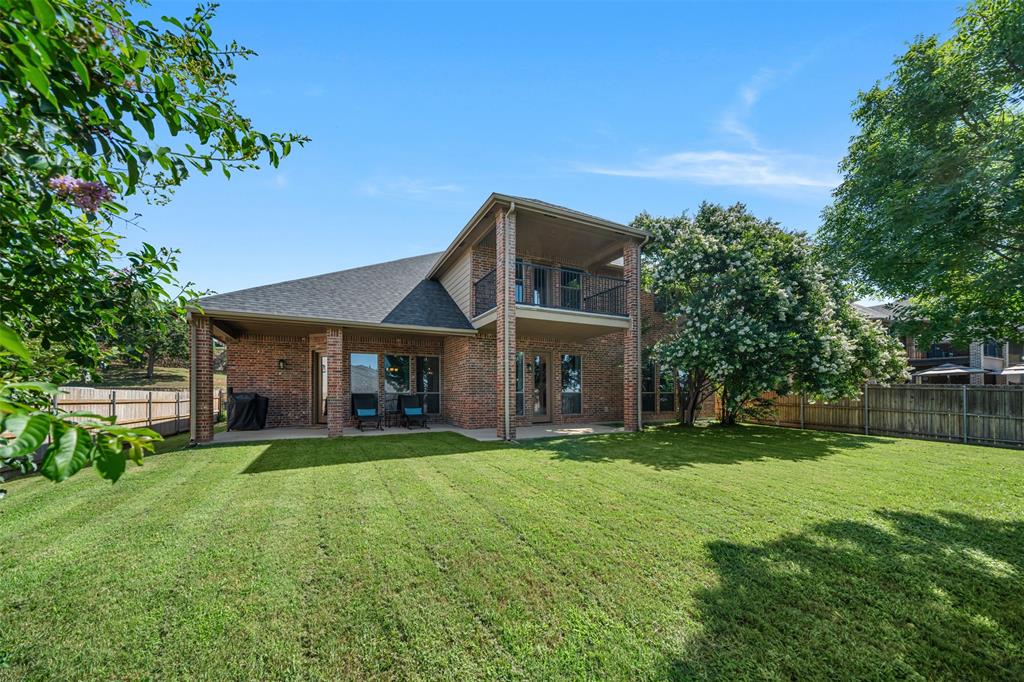 5048 Exposition Way Fort Worth, TX 76244 - Photo 36 of 39 a view of a house with a yard and sitting area