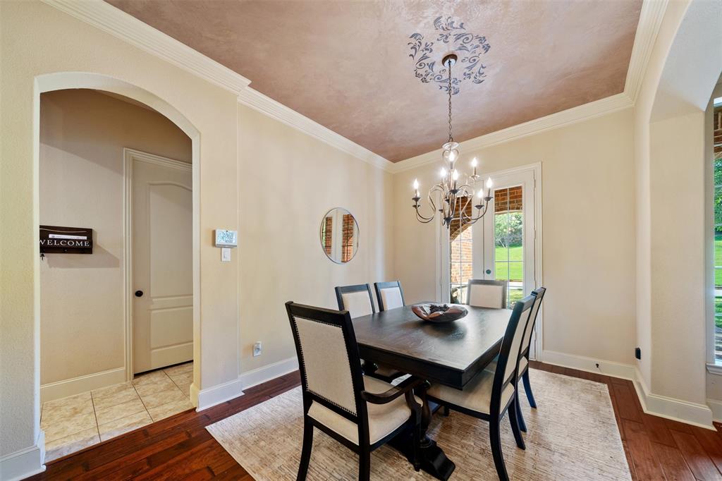 5048 Exposition Way Fort Worth, TX 76244 - Photo 5 of 39 a view of a dining room with furniture window and wooden floor