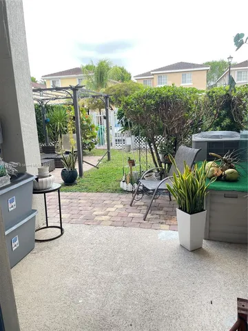 a view of a porch with furniture