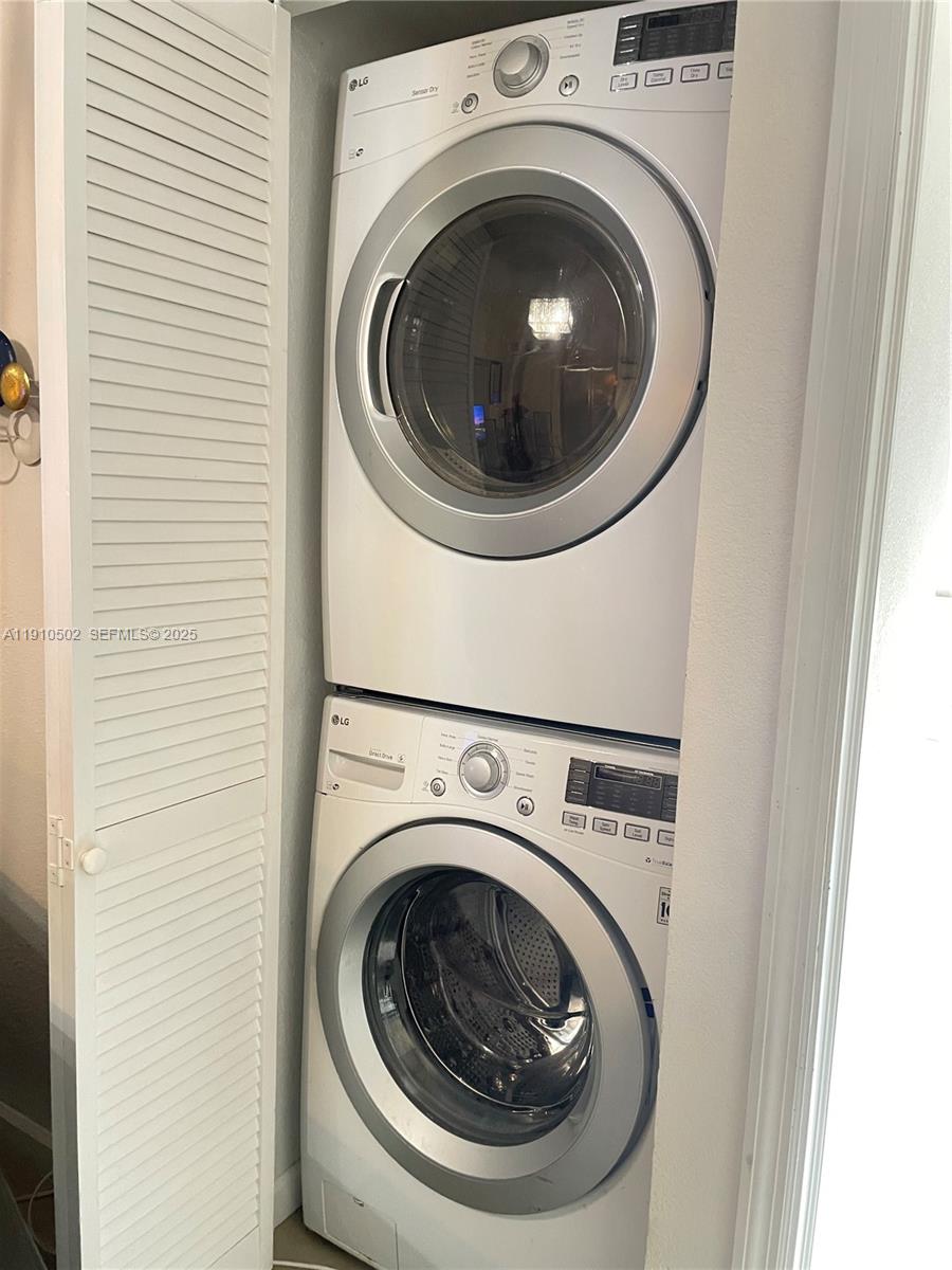 27563 Southwest 139th Place, Unit B Homestead, FL 33032 - Photo 7 of 17 a utility room with dryer and washer