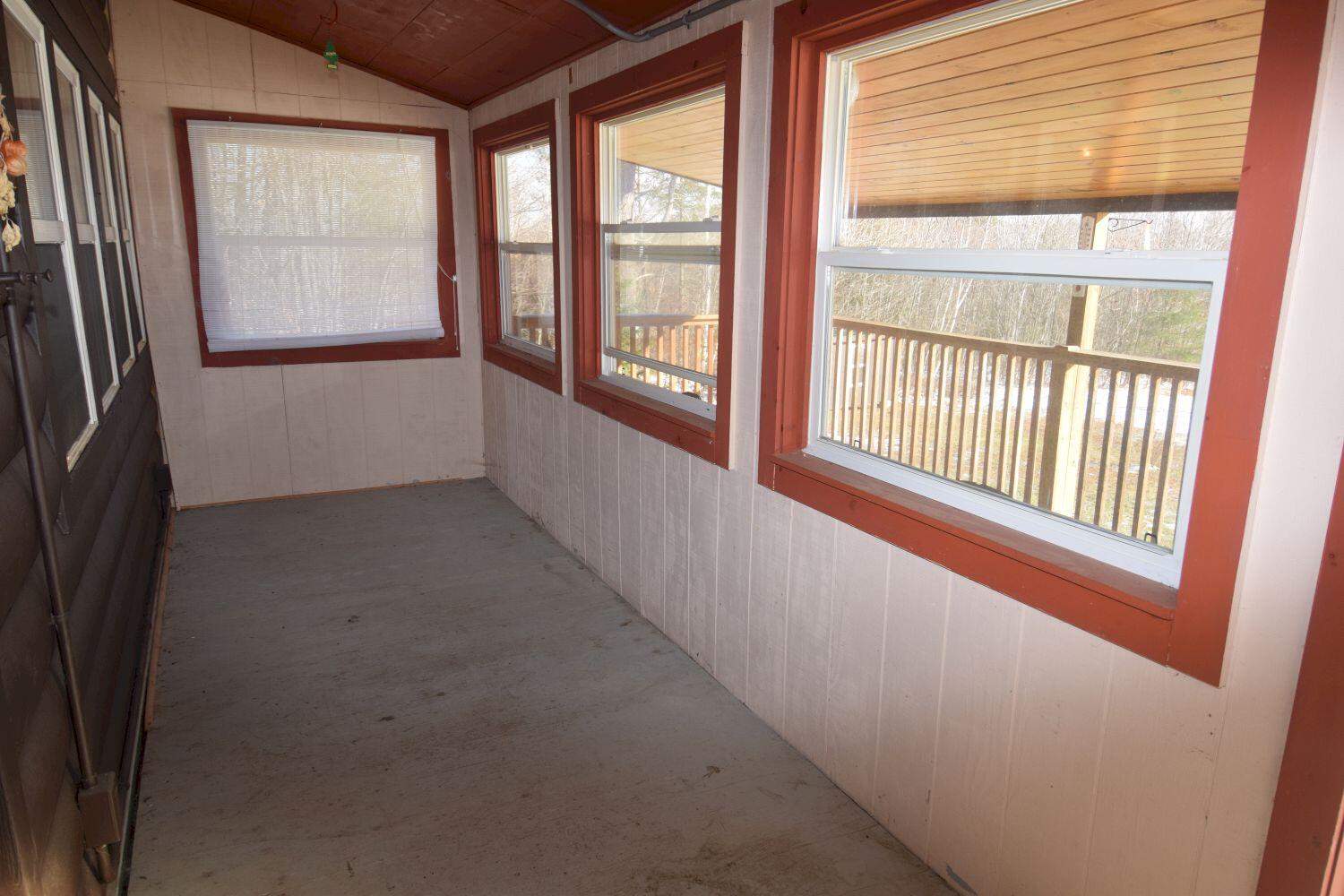 61 Mayhew Road Starks, ME 04911 - Photo 33 of 42 Screen porch