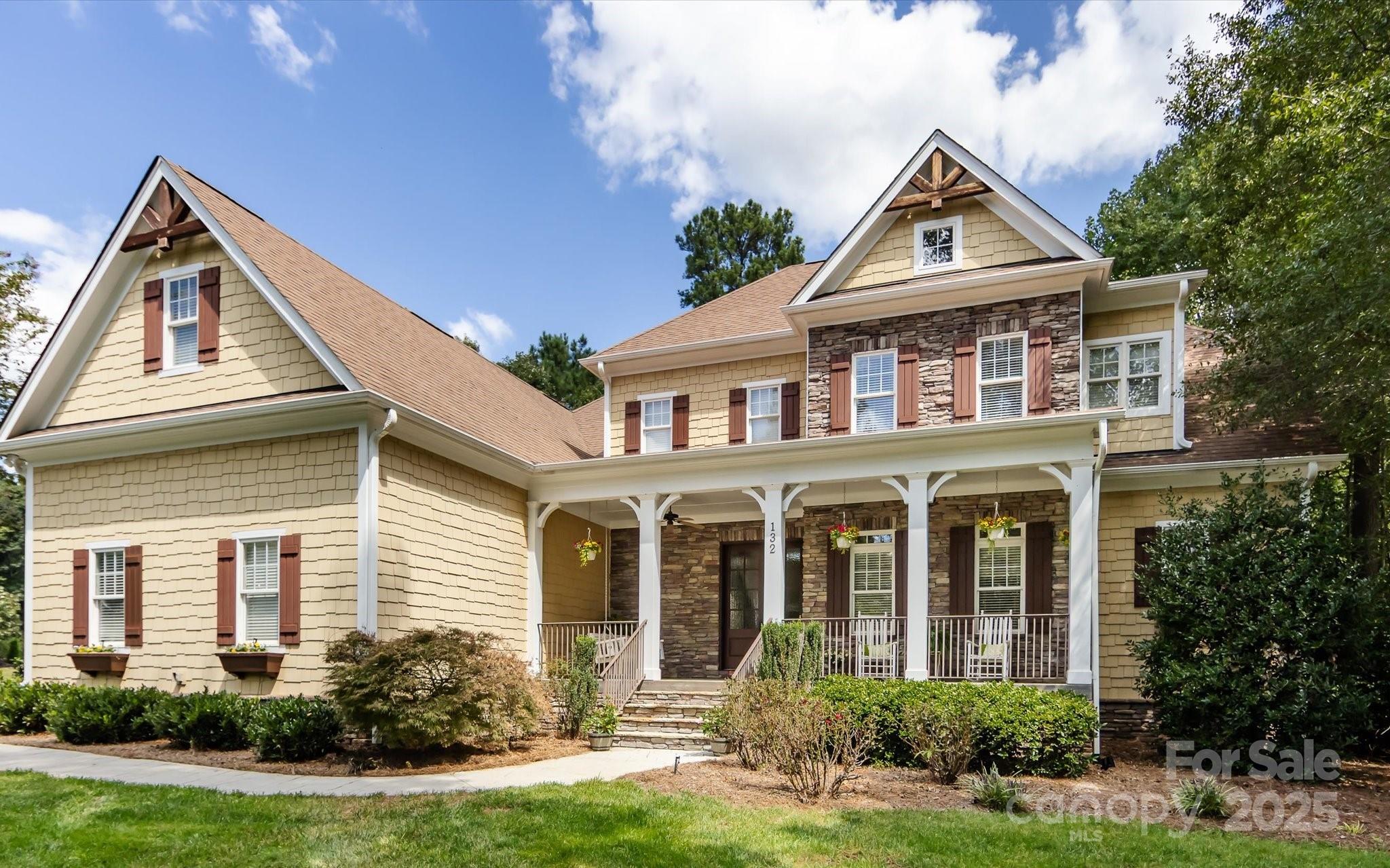 front view of a house with a yard