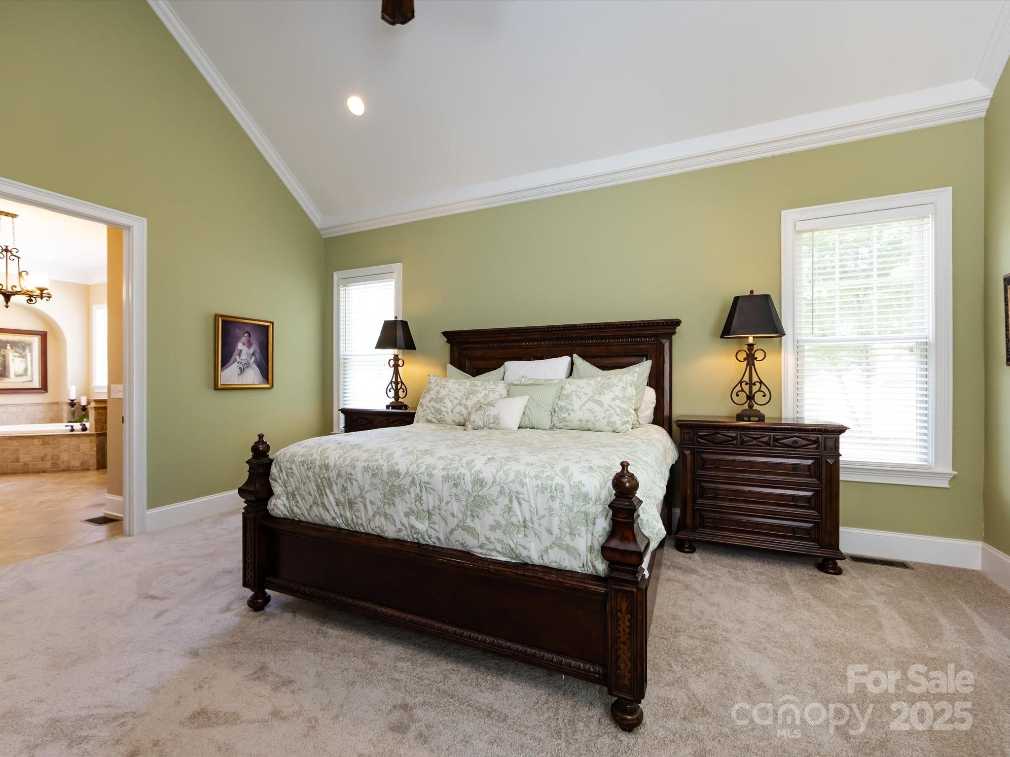 132 Chaska Loop Troutman, NC 28166 - Photo 16 of 48 a bedroom with a bed and a window