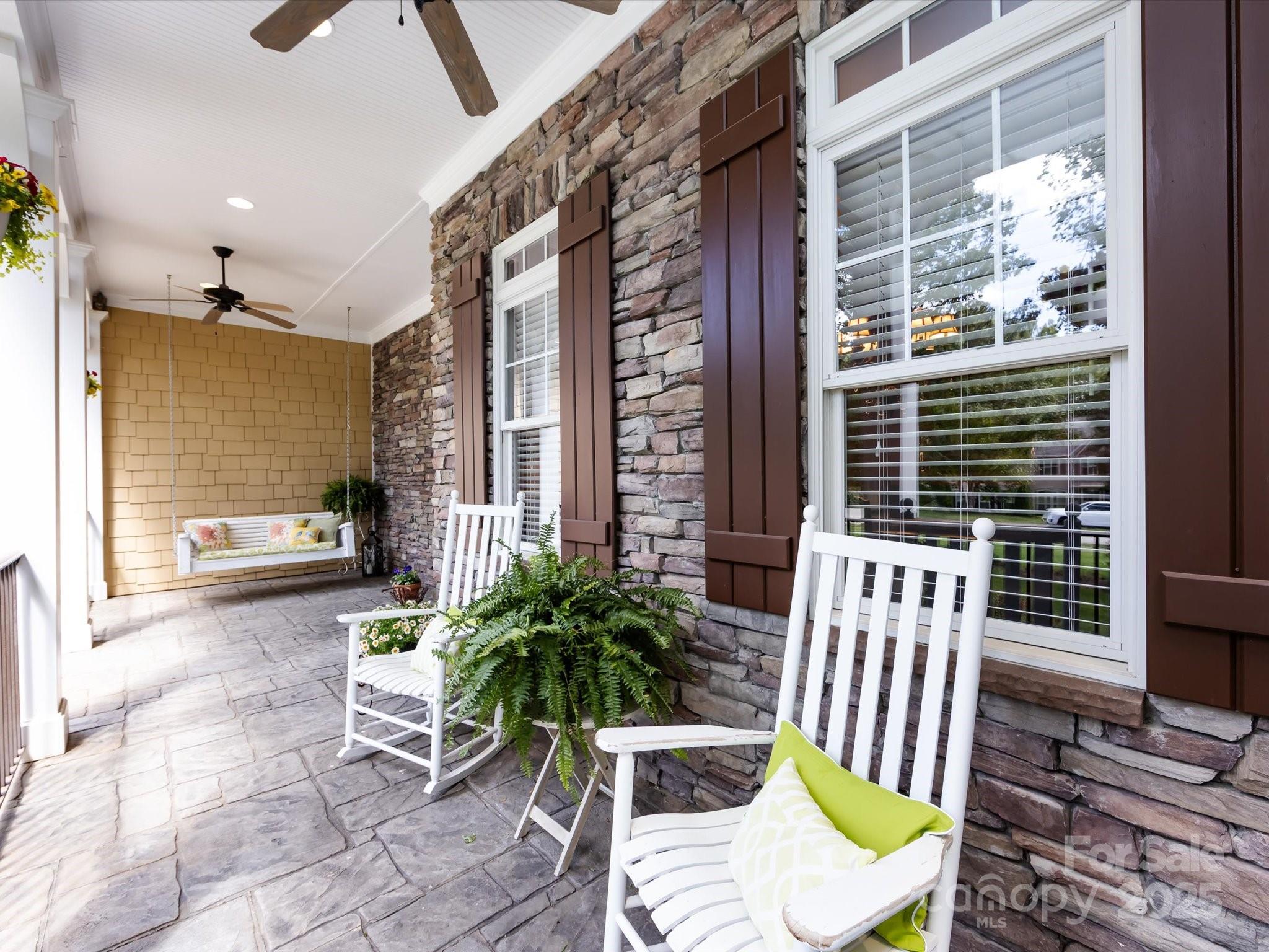 132 Chaska Loop Troutman, NC 28166 - Photo 3 of 48 a view of a porch with furniture