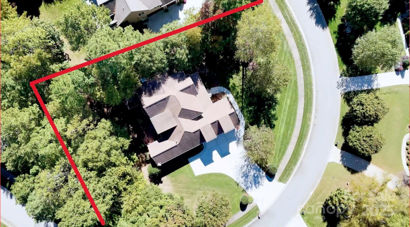 132 Chaska Loop Troutman, NC 28166 - Photo 48 of 48 an aerial view of a house with a yard and garden