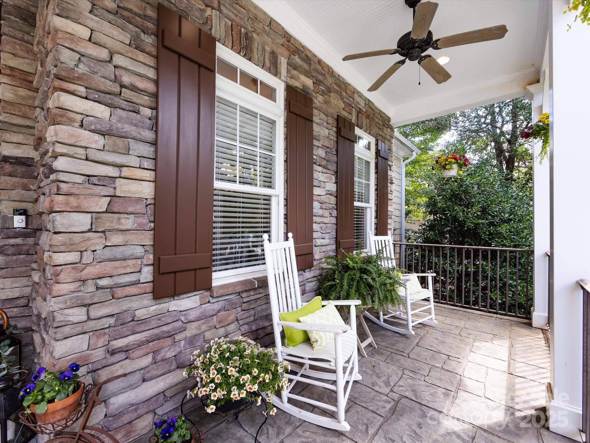 132 Chaska Loop Troutman, NC 28166 - Photo 5 of 48 a view of a chairs and table in a patio