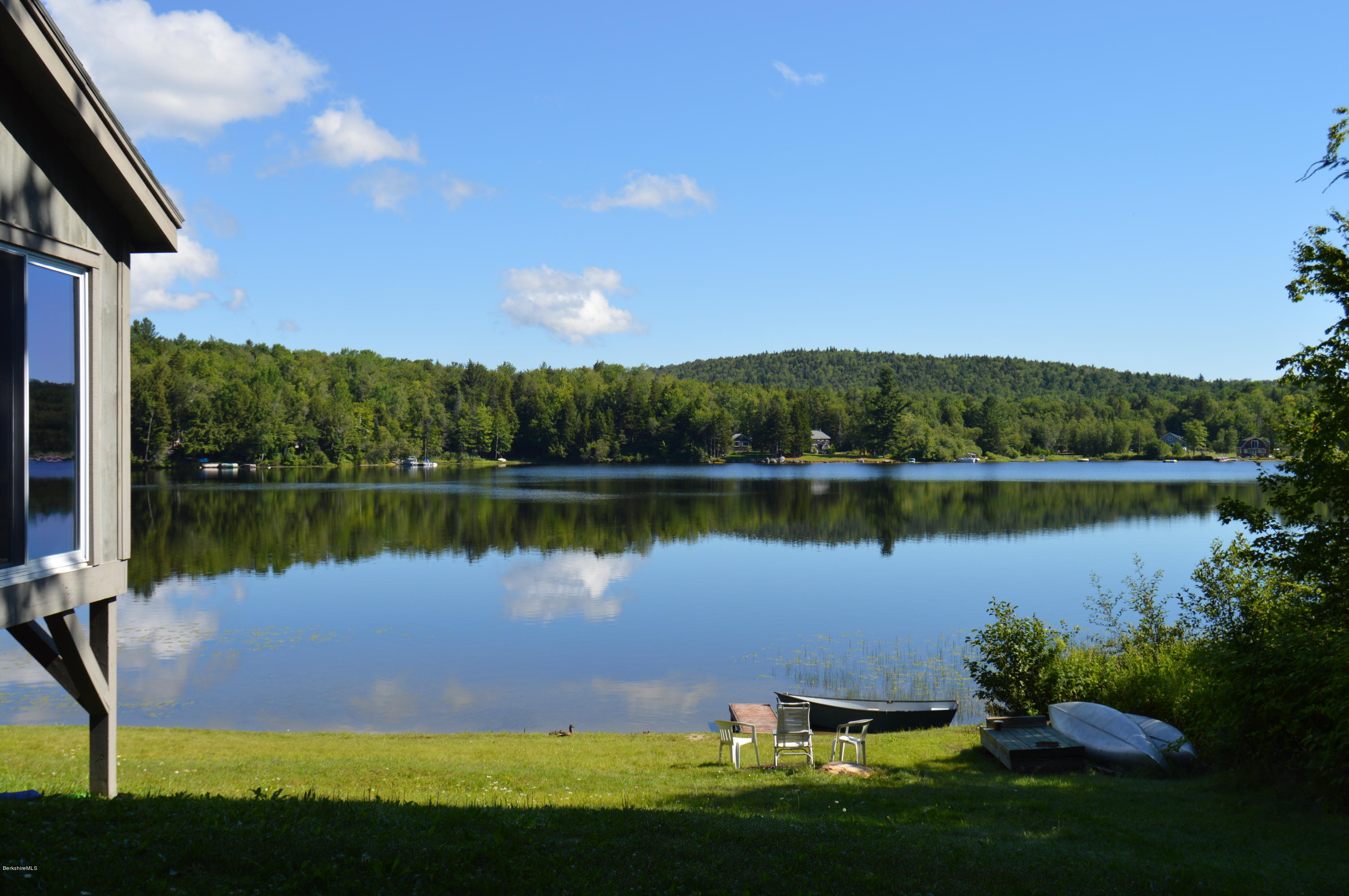 85-86 Windsor Pond Road Windsor, MA 01270 - Photo 1 of 22 a view of a lake with a city view