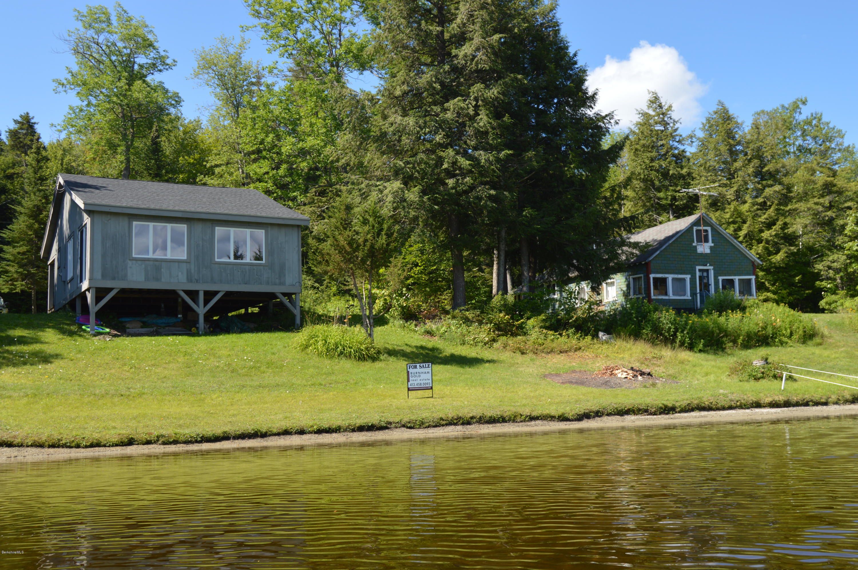 85-86 Windsor Pond Road Windsor, MA 01270 - Photo 4 of 22 a front view of a house with garden