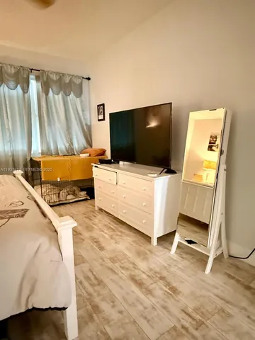 a bathroom with a tub and a shower