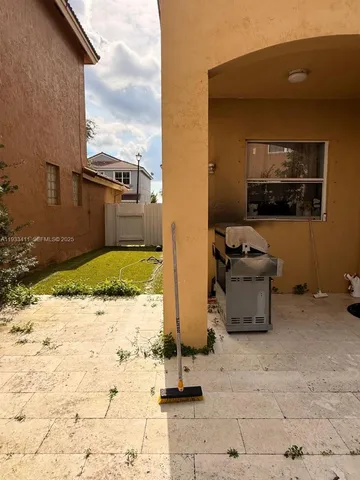 a view of a swimming pool with chairs