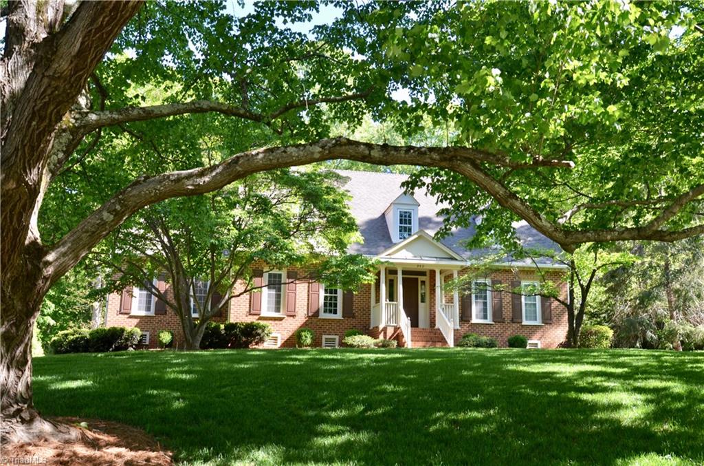 952 Bryanplace Road Winston-Salem, NC 27104 - Photo 1 of 30 Low maintenance brick and vinyl home built by Tom Stevenson~ beautifully situated on a park-like knoll with gorgeous maple trees, two kosa dogwoods, azaleas, rhododendrun, english boxwoods. A few years a go a border of green giants (back left side of property) and a fig tree were added.
