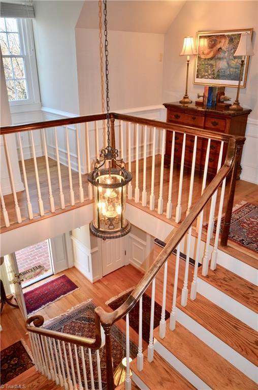 952 Bryanplace Road Winston-Salem, NC 27104 - Photo 16 of 30 Upper landing: crown molding replaced, stairwell light added, recessed cans added and LVP flooring. Fresh paint 2019.