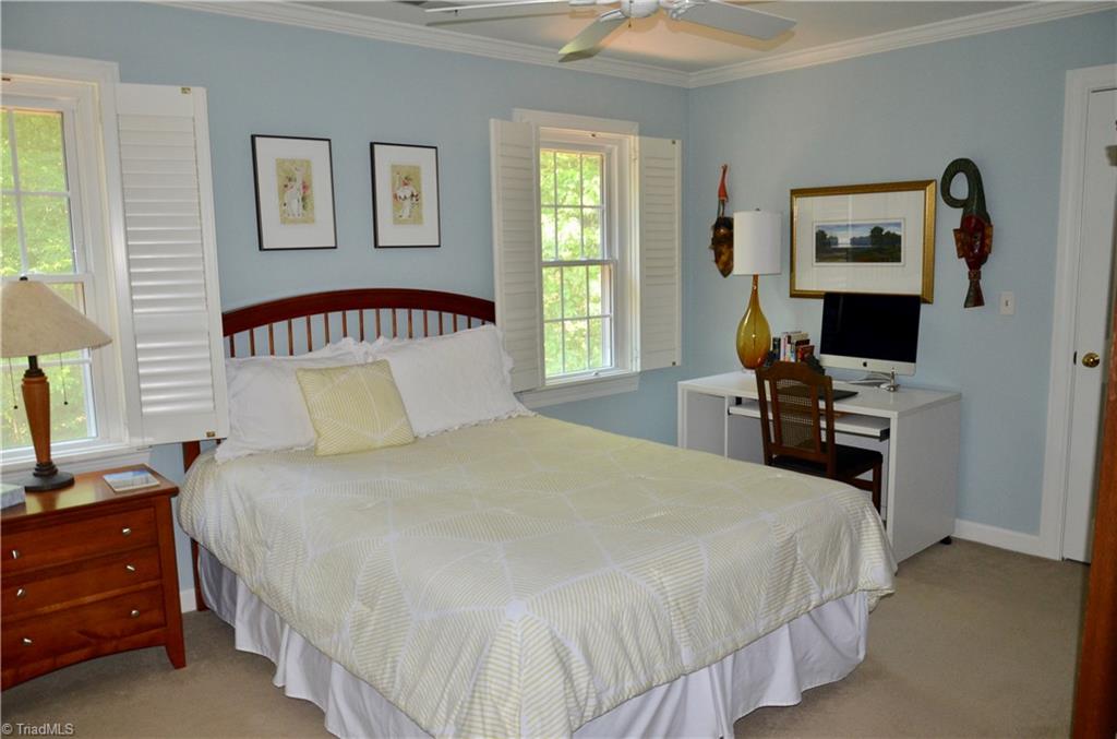 952 Bryanplace Road Winston-Salem, NC 27104 - Photo 22 of 30 3rd BR has crown molding, ceiling fan added, plantations shutters and great storage with (3) three (uncommon) closets.