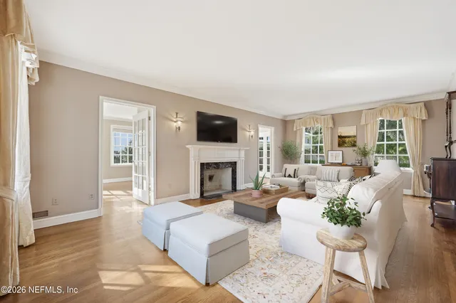 a kitchen with stainless steel appliances wooden cabinets and a stove