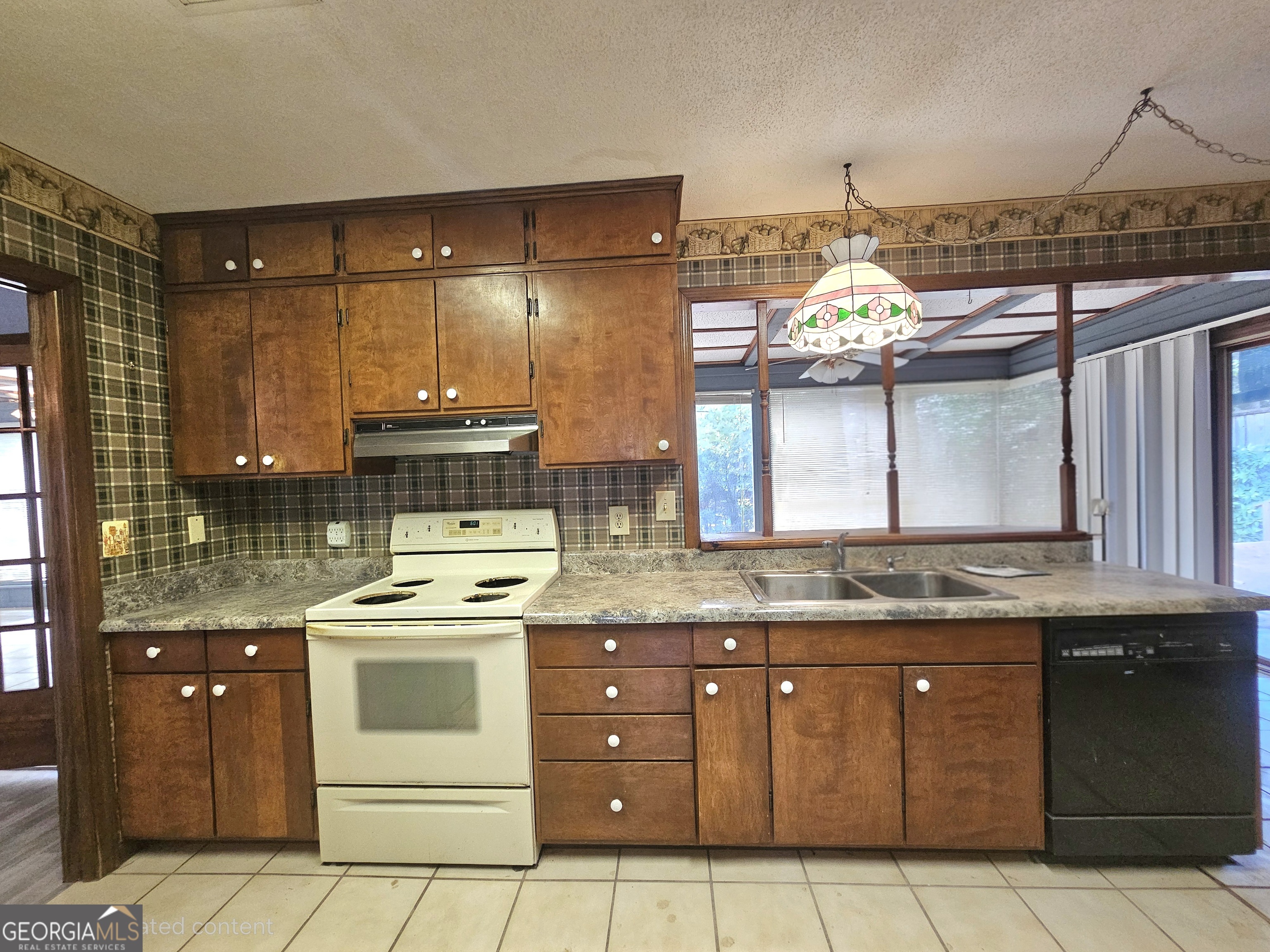 96 Glencrest Drive Toccoa, GA 30577 - Photo 5 of 15 a kitchen with a stove and a sink