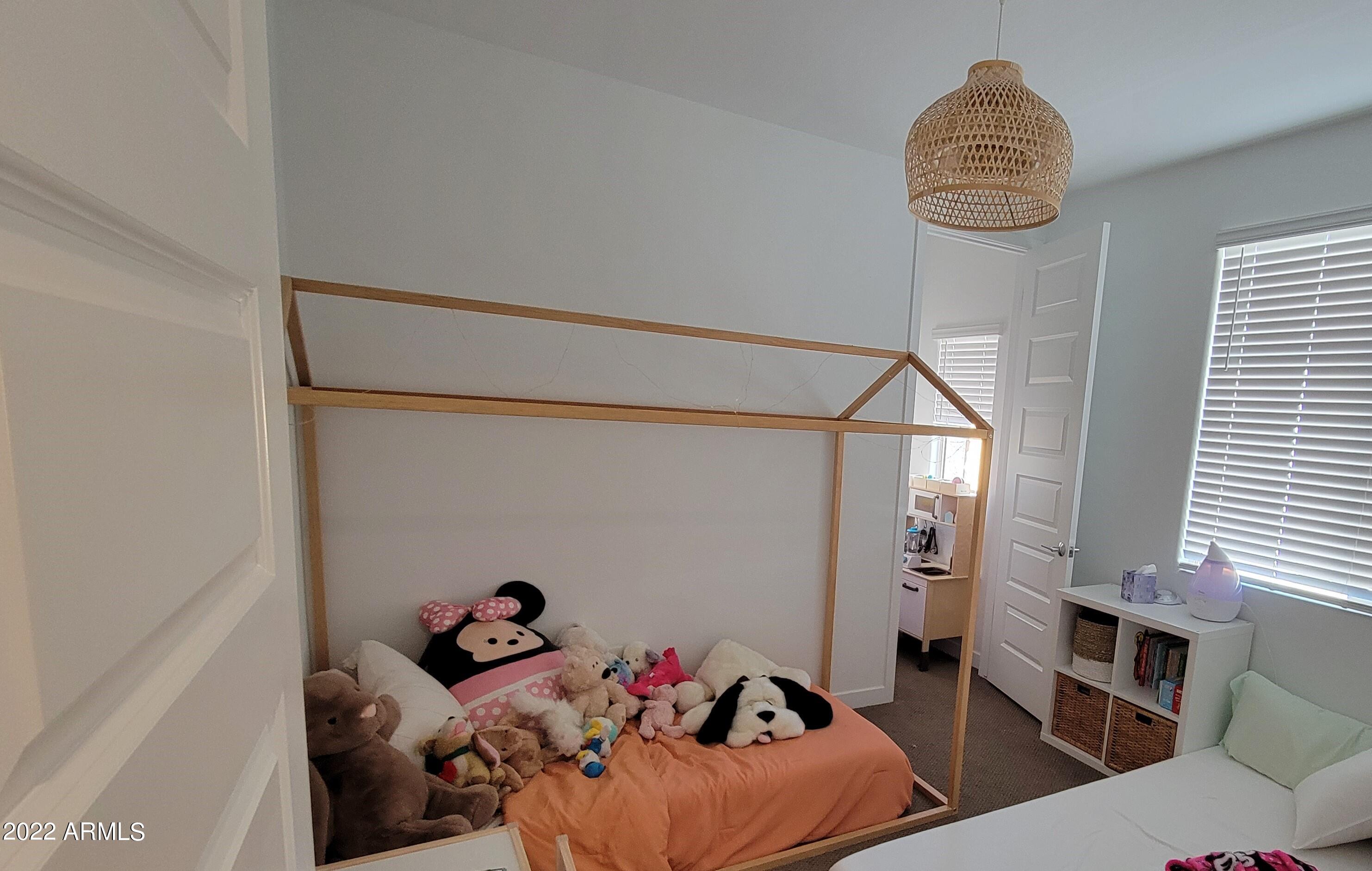 4100 South Pinelake Way, Unit 142 Chandler, AZ 85249 - Photo 13 of 25 a living room with furniture and a window