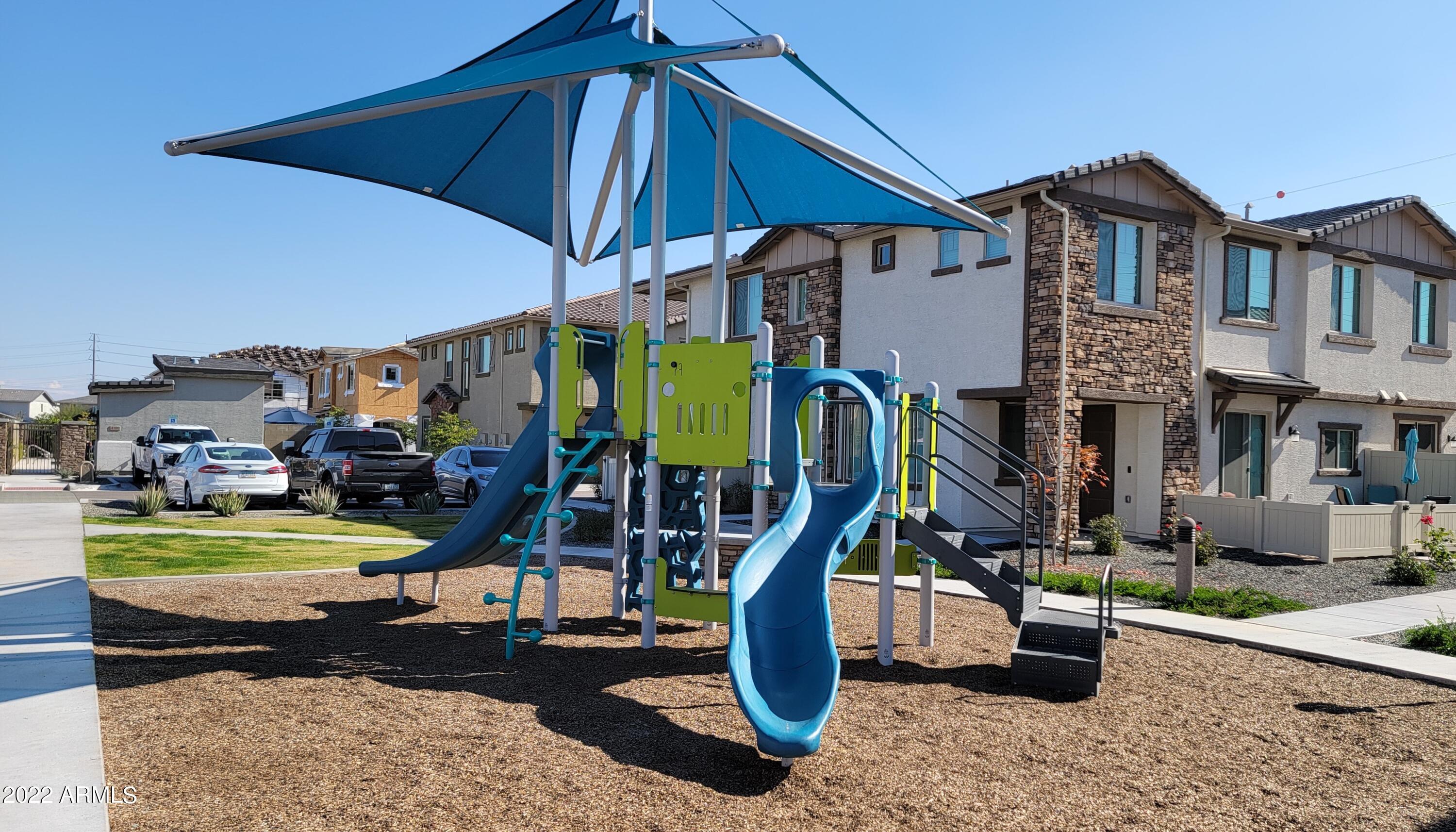 4100 South Pinelake Way, Unit 142 Chandler, AZ 85249 - Photo 22 of 25 a view of a house with basketball court
