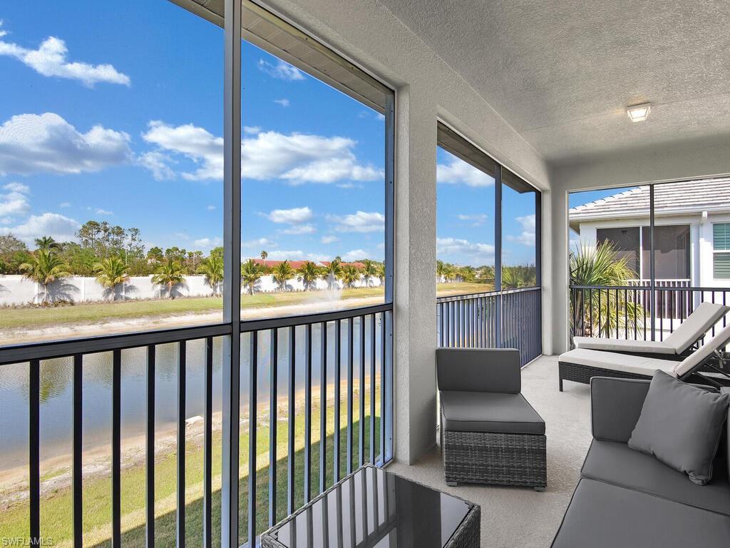 2561 Seychelles Drive, Unit 308 Naples, FL 34112 - Photo 21 of 28 a view of roof deck with patio