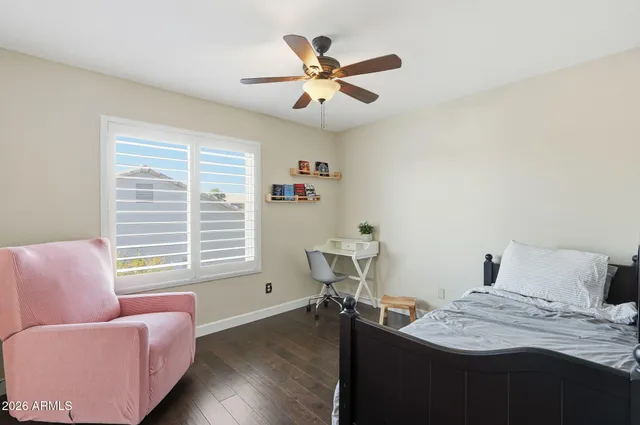 a work room with furniture and windows