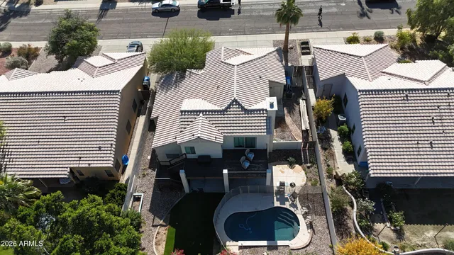 a front view of a house with sitting space