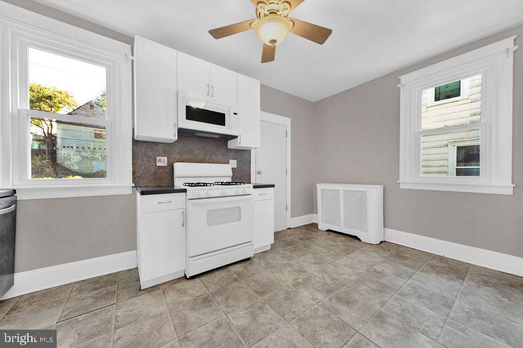 337 Cheswold Road Drexel Hill, PA 19026 - Photo 8 of 17 Bright and airy kitchen with modern finishes.