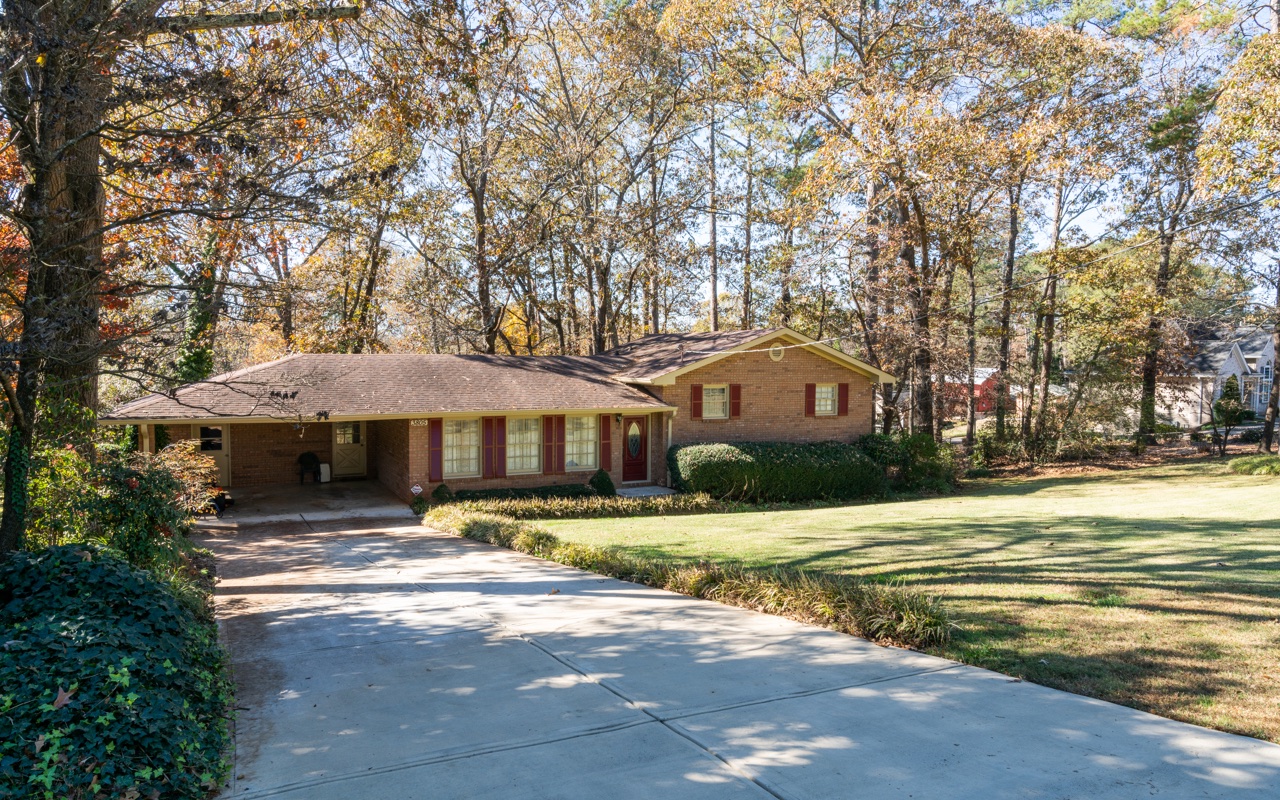 3805 Hilldale Road Oakwood, GA 30566 - Photo 24 of 28 a house with trees in front of it
