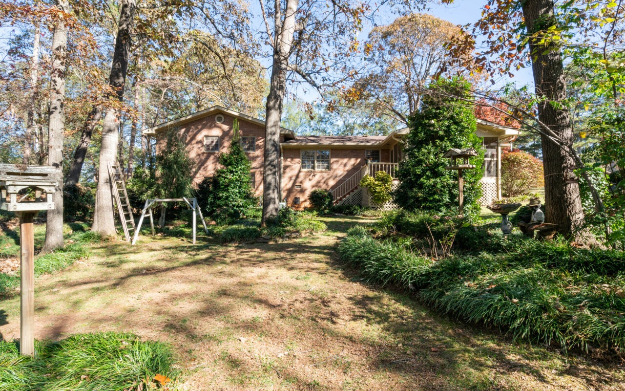 3805 Hilldale Road Oakwood, GA 30566 - Photo 26 of 28 a view of a yard with plants and trees