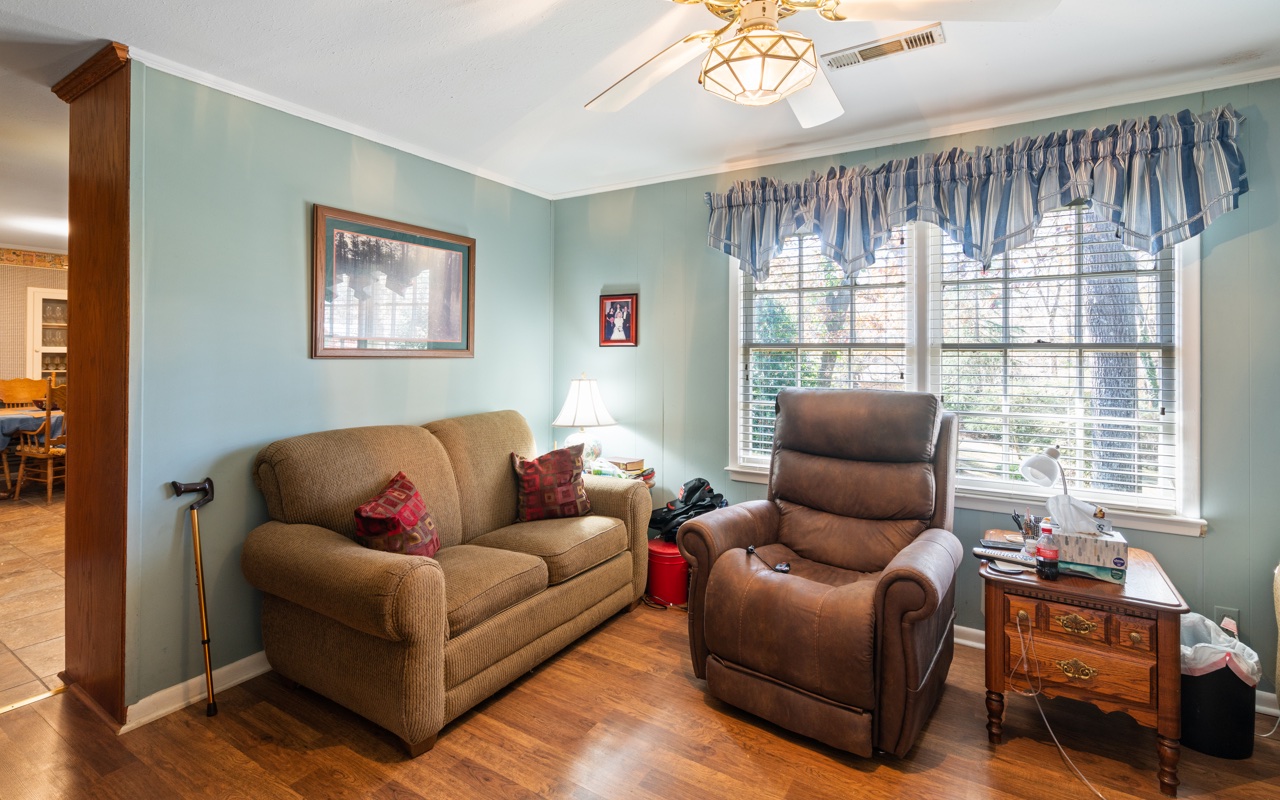3805 Hilldale Road Oakwood, GA 30566 - Photo 9 of 28 a living room with furniture and a window