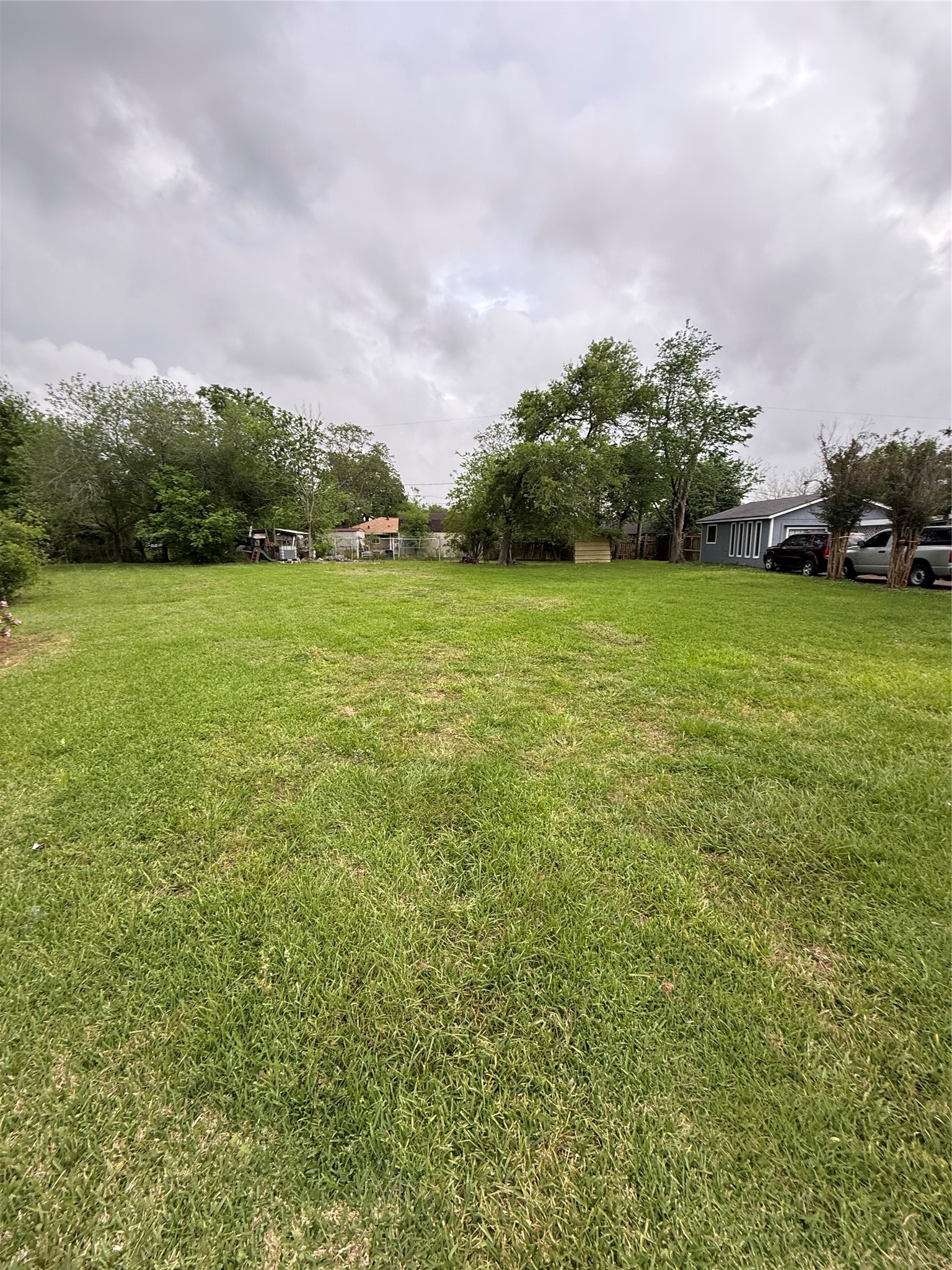 0 Timber Lane Baytown, TX 77520 - Photo 4 of 6 a view of a field of grass and trees