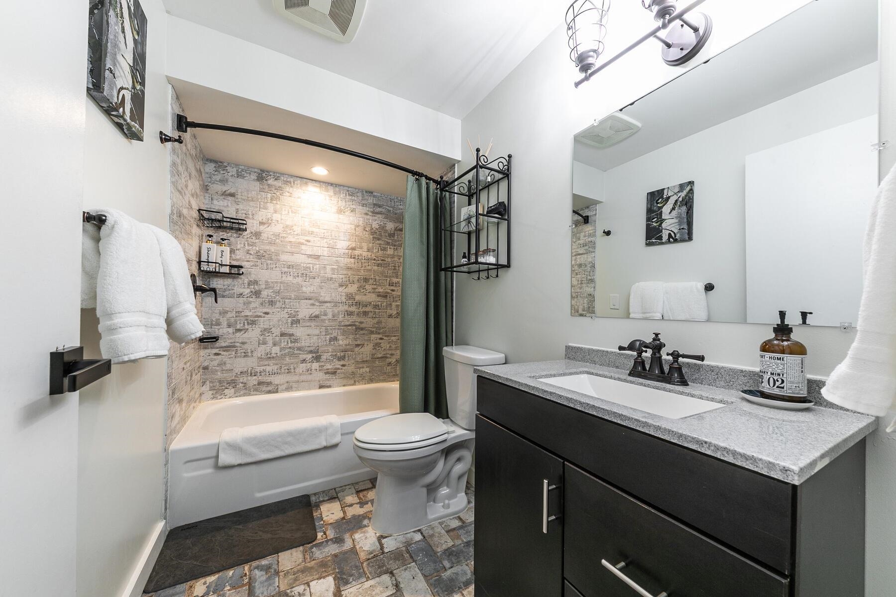 16844 Pasquale Road Nevada City, CA 95959 - Photo 13 of 27 a bathroom with a sink a toilet and shower