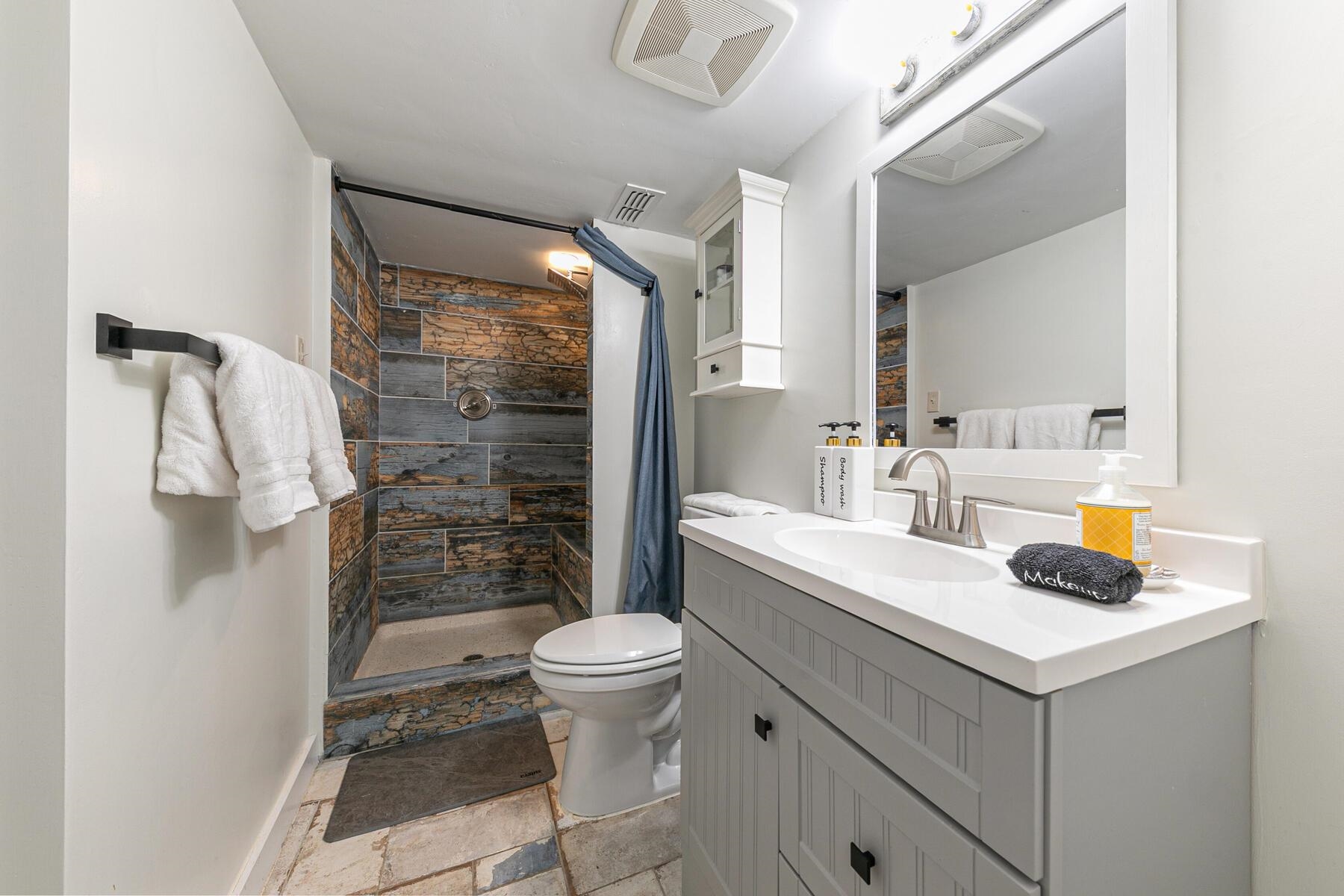16844 Pasquale Road Nevada City, CA 95959 - Photo 19 of 27 a bathroom with a sink toilet and shower