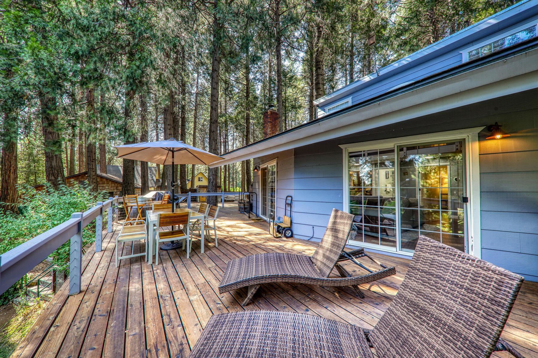 16844 Pasquale Road Nevada City, CA 95959 - Photo 2 of 27 a view of backyard with outdoor seating and wooden floor