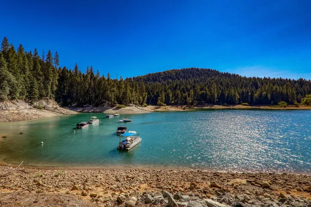 a view of a street with a building in the background