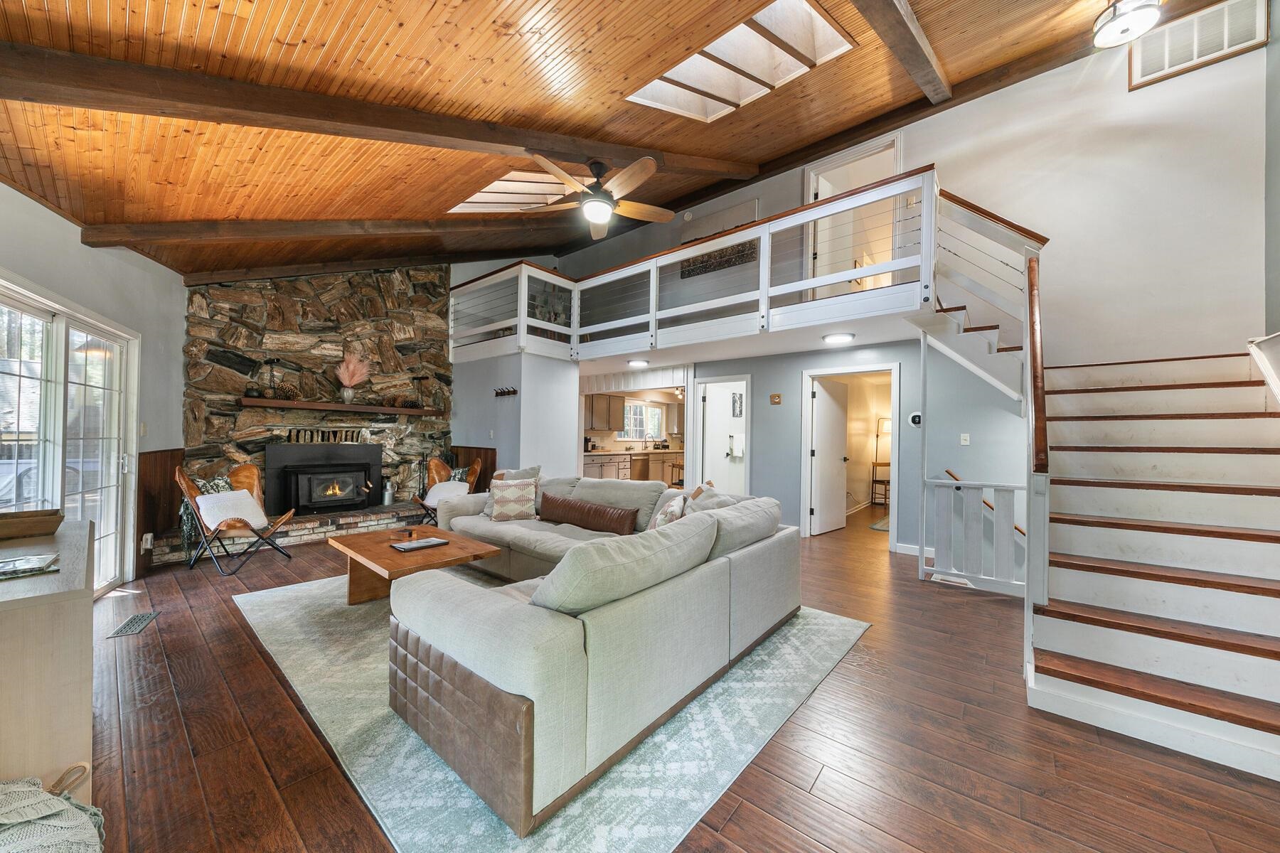 16844 Pasquale Road Nevada City, CA 95959 - Photo 10 of 27 a living room with furniture and a fireplace