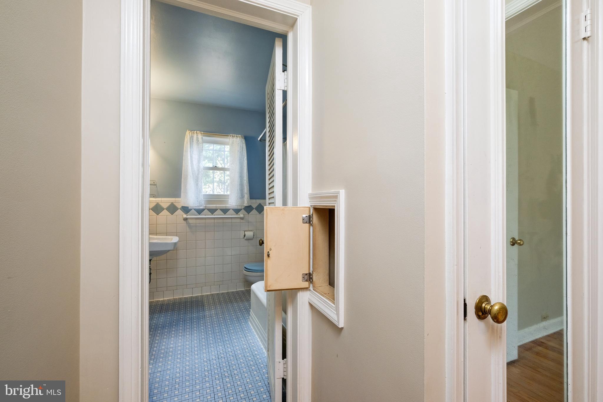 3940 2nd Street Southwest Washington, DC 20032 - Photo 33 of 70 Bathroom I - Entry Level with Laundry Chute Open