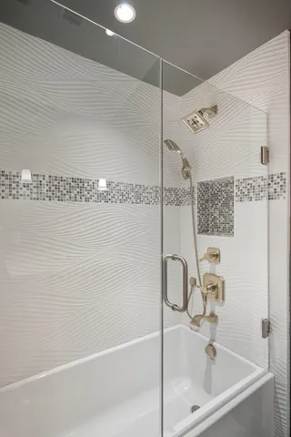 a bathroom with a sink and a shower